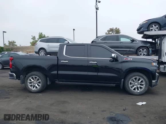 2019 Chevrolet Silverado 1500 LTZ z VIN 1GCUYGEL2KZ124839, wystawiony jako IAAI lot #42408653 z przebiegiem 78 672 mil mil oraz . Historia ofert i sprzedaży dostępna na DreamBid. Obrazek 13.