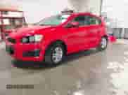2014 Chevrolet Sonic LT z VIN 1G1JD6SH8E4164720, wystawiony jako IAAI lot #43169999 z przebiegiem 91 833 mil mil oraz . Historia ofert i sprzedaży dostępna na DreamBid. Obrazek 2.
