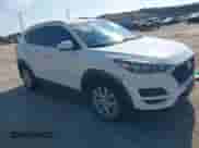 2019 Hyundai Tucson Value z VIN KM8J3CA42KU983740, wystawiony jako IAAI lot #42978756 z przebiegiem 75 438 mil mil oraz . Historia ofert i sprzedaży dostępna na DreamBid. Obrazek 1.