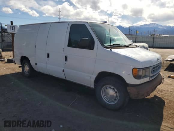 2002 Ford Econoline Cargo with VIN 1FTRE142X2HA55487, listed as a Copart auction lot 52957645 with 270,731 mi miles and Clean title. Bid and sale history available at DreamBid. Image 4.