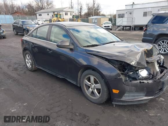 2014 Chevrolet Cruze 1LT с VIN 1G1PC5SB0E7115268, выставлен на аукционе IAAI как лот 41215016 с пробегом 151 588 миль миль и . История ставок и продаж доступна на DreamBid. Изображение 1.