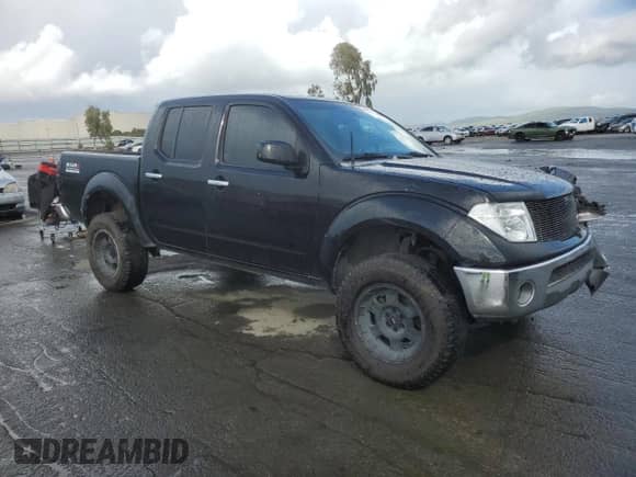 2005 Nissan Frontier SE z VIN 1N6AD07W55C430709, wystawiony jako Copart lot #49446725 z przebiegiem 233 907 mil mil oraz Szkoda całkowita • Salvage title. Historia ofert i sprzedaży dostępna na DreamBid. Obrazek 4.
