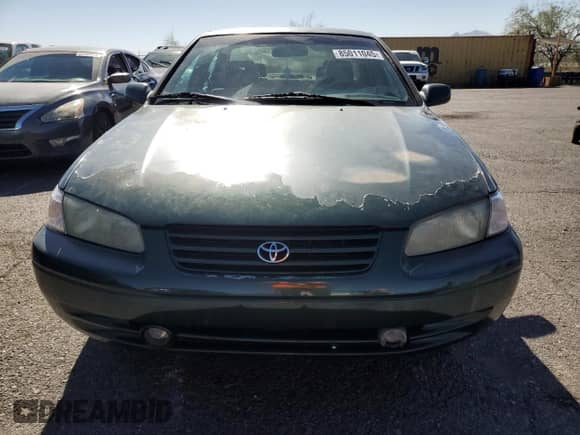1999 Toyota Camry LE z VIN JT2BG28KXX0359137, wystawiony jako Copart lot #85011045 z przebiegiem 158 951 mil mil oraz Czysty tytuł • Clean title. Historia ofert i sprzedaży dostępna na DreamBid. Obrazek 5.