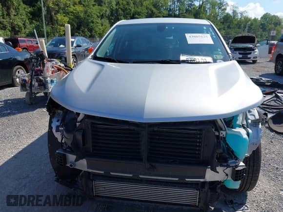 2018 Chevrolet Equinox LT z VIN 2GNAXJEV6J6202643, wystawiony jako IAAI lot #43005625 z przebiegiem 52 382 mil mil oraz . Historia ofert i sprzedaży dostępna na DreamBid. Obrazek 13.