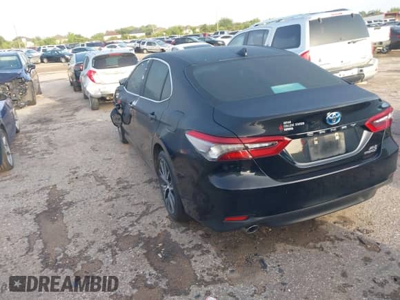 2021 Toyota Camry Hybrid XLE with VIN 4T1F31AK6MU547694, listed as a IAAI auction lot 42618333 with 18,489 mi miles and . Bid and sale history available at DreamBid. Image 3.