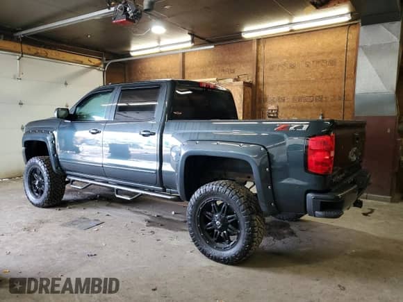 2018 Chevrolet Silverado 1500 LT z VIN 3GCUKREC2JG477920, wystawiony jako Copart lot #84194025 z przebiegiem 95 902 mil mil oraz Szkoda całkowita • Salvage title. Historia ofert i sprzedaży dostępna na DreamBid. Obrazek 2.