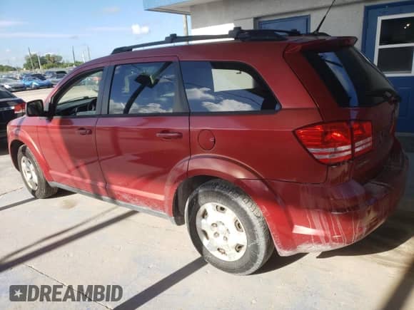 2010 Dodge Journey SE с VIN 3D4PG4FB2AT282286, выставлен на аукционе Copart как лот 83937885 с пробегом 85 799 миль миль и Списание • Salvage title. История ставок и продаж доступна на DreamBid. Изображение 2.