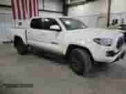 2023 Toyota Tacoma SR5 with VIN 3TYAZ5CN2PT042244, listed as a Copart auction lot 76022534 with 9,551 mi miles and Salvage title. Bid and sale history available at DreamBid. Image 4.