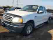 2000 Ford F-150 with VIN 2FTZX1721YCB17221, listed as a Copart auction lot 86729065 with 138,188 mi miles and Clean title. Bid and sale history available at DreamBid. Image 1.