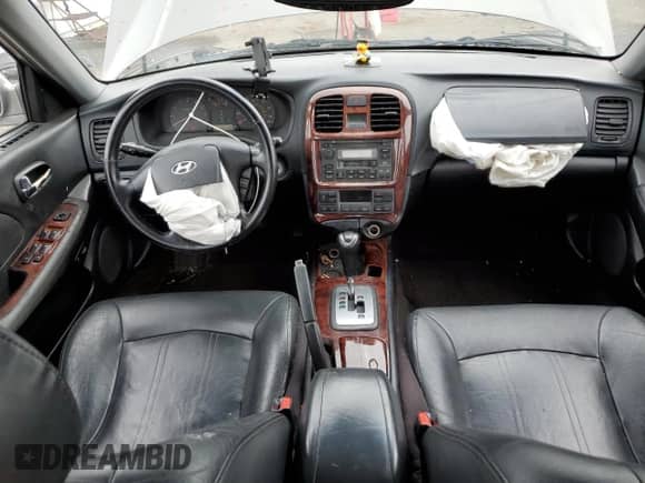 2003 Hyundai Sonata GLS z VIN KMHWF35H43A871938, wystawiony jako Copart lot #63203385 z przebiegiem 85 449 mil mil oraz Szkoda całkowita • Salvage title. Historia ofert i sprzedaży dostępna na DreamBid. Obrazek 8.