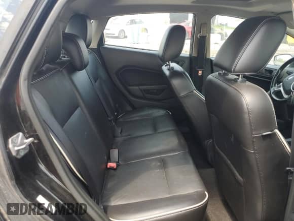 2011 Ford Fiesta SES z VIN 3FADP4FJXBM166844, wystawiony jako Copart lot #58949035 z przebiegiem 158 924 mil mil oraz Czysty tytuł • Clean title. Historia ofert i sprzedaży dostępna na DreamBid. Obrazek 10.