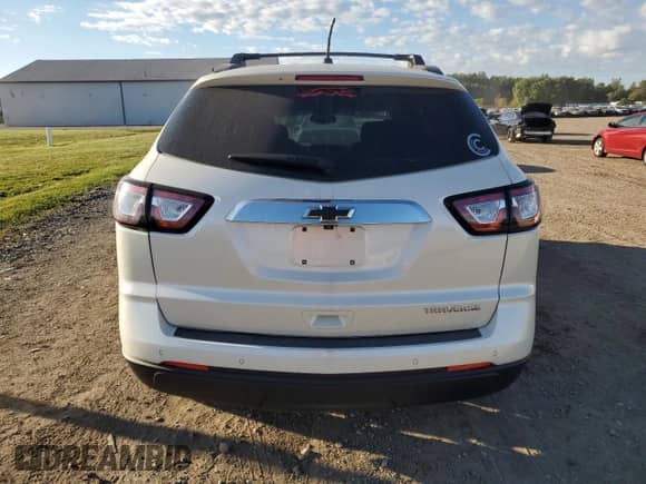 2013 Chevrolet Traverse LT с VIN 1GNKRGKD0DJ214243, выставлен на аукционе Copart как лот 82180835 с пробегом 222 348 миль миль и Списание • Salvage title. История ставок и продаж доступна на DreamBid. Изображение 6.