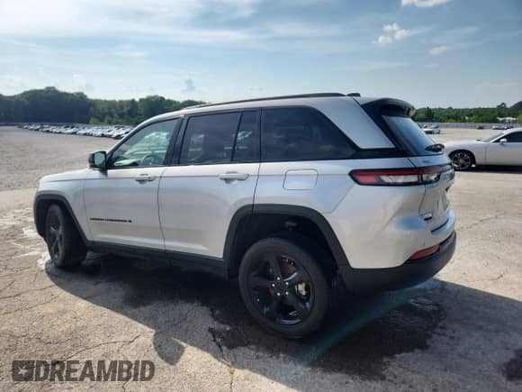 2023 Jeep Grand Cherokee Altitude with VIN 1C4RJHAG3PC661867, listed as a Copart auction lot 66457085 with 26,838 mi miles and Salvage title. Bid and sale history available at DreamBid. Image 2.