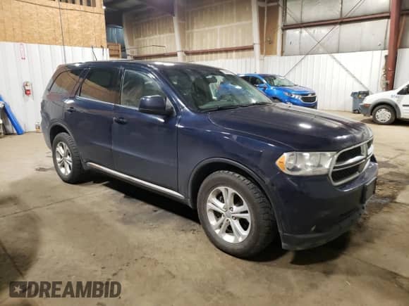 2012 Dodge Durango SXT with VIN 1C4RDJAG2CC267026, listed as a Copart auction lot 71364145 with 129,796 mi miles and Salvage title. Bid and sale history available at DreamBid. Image 4.