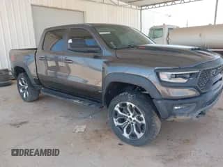 2022 Ram 1500 TRX with VIN 1C6SRFU97NN353587, listed as a IAAI auction lot 42174702 with 35,305 mi miles and . Bid and sale history available at DreamBid. Image 1.