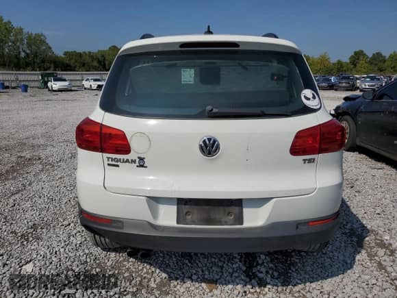 2017 Volkswagen Tiguan S с VIN WVGAV7AX6HK049404, выставлен на аукционе Copart как лот 69989865 с пробегом 93 717 миль миль и Списание • Salvage title. История ставок и продаж доступна на DreamBid. Изображение 6.