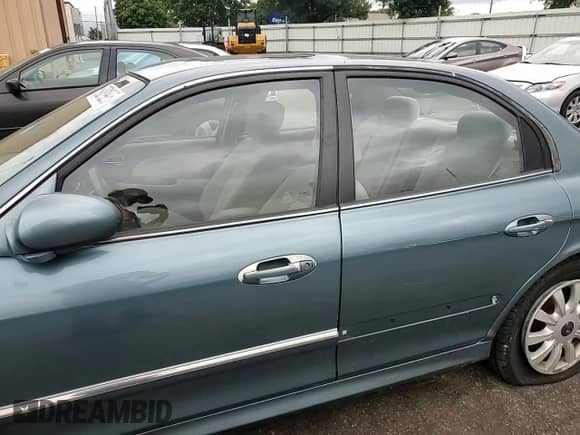 2005 Hyundai Sonata GLS with VIN KMHWF35H65A095122, listed as a Copart auction lot 69081995 with 112,944 mi miles and Salvage title. Bid and sale history available at DreamBid. Image 13.