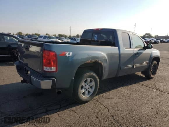 2007 GMC Sierra 1500 Work Truck z VIN 1GTEK19097Z518736, wystawiony jako Copart lot #71458525 z przebiegiem 186 559 mil mil oraz Czysty tytuł • Clean title. Historia ofert i sprzedaży dostępna na DreamBid. Obrazek 3.