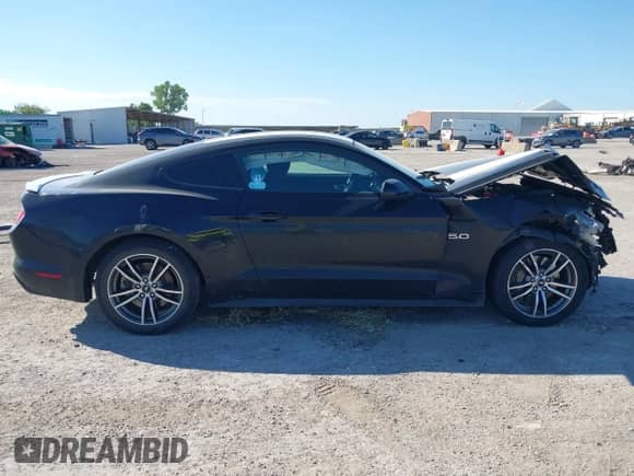 2017 Ford Mustang GT z VIN 1FA6P8CF6H5275932, wystawiony jako IAAI lot #42812292 z przebiegiem 62 411 mil mil oraz . Historia ofert i sprzedaży dostępna na DreamBid. Obrazek 13.