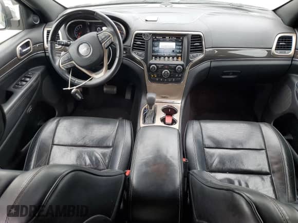 2017 Jeep Grand Cherokee Overland with VIN 1C4RJECG1HC773855, listed as a Copart auction lot 70180755 with 123,525 mi miles and Salvage title. Bid and sale history available at DreamBid. Image 8.