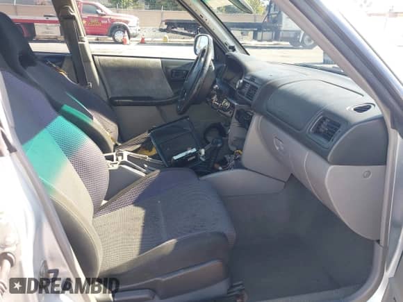 2002 Subaru Forester S with VIN JF1SF65642H705305, listed as a IAAI auction lot 43214359 with Not provided miles and . Bid and sale history available at DreamBid. Image 5.