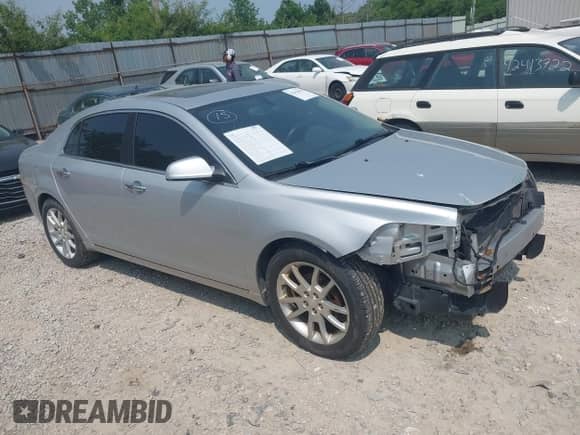 2012 Chevrolet Malibu LTZ z VIN 1G1ZG5E79CF205302, wystawiony jako IAAI lot #42416939 z przebiegiem 186 716 mil mil oraz . Historia ofert i sprzedaży dostępna na DreamBid. Obrazek 1.