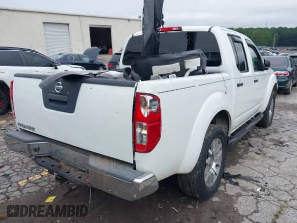 2013 Nissan Frontier SV with VIN 1N6AD0ER6DN729965, listed as a IAAI auction lot 42917426 with 158,426 mi miles and . Bid and sale history available at DreamBid. Image 4.