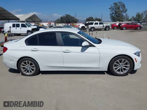 2016 BMW 3 Series 320i with VIN WBA8A9C56GK619015, listed as a IAAI auction lot 42261892 with 126,737 mi miles and . Bid and sale history available at DreamBid. Image 13.