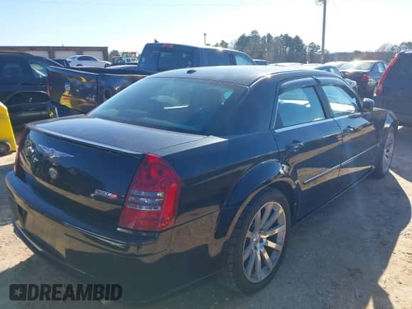 2006 Chrysler 300 C SRT-8 with VIN 2C3LA73W06H216409, listed as a IAAI auction lot 41588832 with 187,662 mi miles and . Bid and sale history available at DreamBid. Image 4.