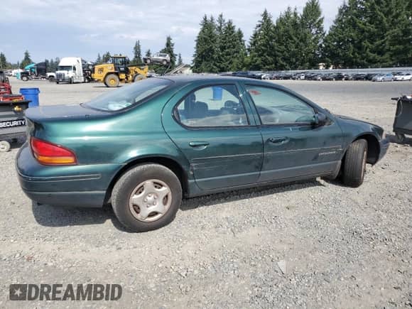 1998 Dodge Stratus with VIN 1B3EJ46X0WN303386, listed as a Copart auction lot 80188805 with 126,228 mi miles and Salvage title. Bid and sale history available at DreamBid. Image 3.