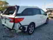 2018 Honda Odyssey EX with VIN 5FNRL6H57JB044727, listed as a Copart auction lot 86117065 with 112,962 mi miles and Salvage title. Bid and sale history available at DreamBid. Image 3.