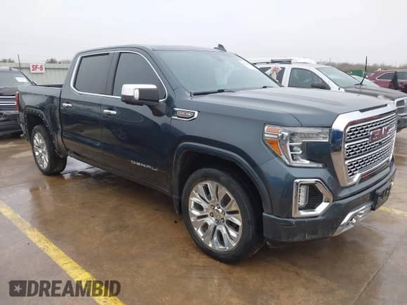 2020 GMC Sierra 1500 Denali with VIN 1GTU9FEL1LZ120581, listed as a IAAI auction lot 41428827 with 97,917 mi miles and . Bid and sale history available at DreamBid. Image 1.