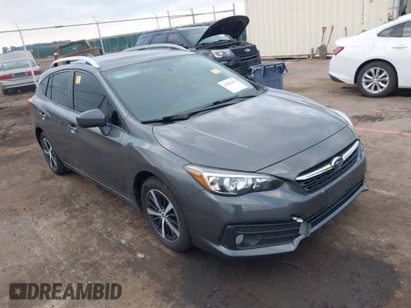 2021 Subaru Impreza Premium with VIN 4S3GTAD67M3711211, listed as a IAAI auction lot 42943255 with 97,769 mi miles and . Bid and sale history available at DreamBid. Image 1.