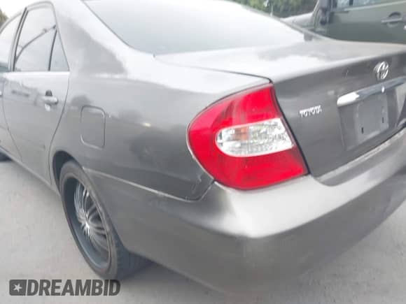 2003 Toyota Camry LE with VIN JTDBE32K130230810, listed as a IAAI auction lot 43552834 with 199,383 mi miles and . Bid and sale history available at DreamBid. Image 14.