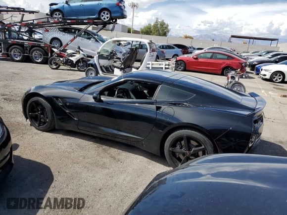 2014 Chevrolet Corvette 1LT z VIN 1G1YB2D78E5109311, wystawiony jako Copart lot #70569704 z przebiegiem 19 457 mil mil oraz Szkoda całkowita • Salvage title. Historia ofert i sprzedaży dostępna na DreamBid. Obrazek 2.