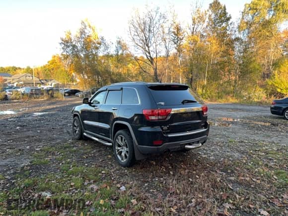 2011 Jeep Grand Cherokee Overland Summit with VIN 1J4RR6GT1BC605396, listed as a Copart auction lot 89735905 with 166,454 mi miles and Clean title. Bid and sale history available at DreamBid. Image 3.