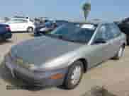 1999 Saturn SL с VIN 1G8ZH5280XZ249494, выставлен на аукционе IAAI как лот 42347493 с пробегом 106 491 миль миль и . История ставок и продаж доступна на DreamBid. Изображение 2.