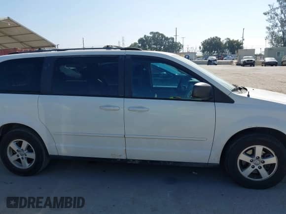 2010 Dodge Grand Caravan SE z VIN 2D4RN4DE5AR237793, wystawiony jako IAAI lot #42837195 z przebiegiem 267 873 mil mil oraz . Historia ofert i sprzedaży dostępna na DreamBid. Obrazek 13.