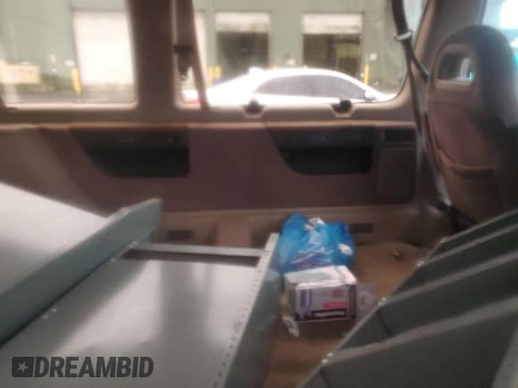 1992 Ford Econoline Cargo с VIN 1FMEE11H2NHB41366, выставлен на аукционе Copart как лот 89864635 с пробегом 323 005 миль миль и Чистый • Clean title. История ставок и продаж доступна на DreamBid. Изображение 11.