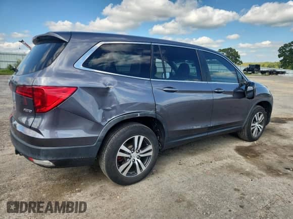 2016 Honda Pilot EX z VIN 5FNYF6H30GB106298, wystawiony jako Copart lot #70598285 z przebiegiem 98 798 mil mil oraz Czysty tytuł • Clean title. Historia ofert i sprzedaży dostępna na DreamBid. Obrazek 3.