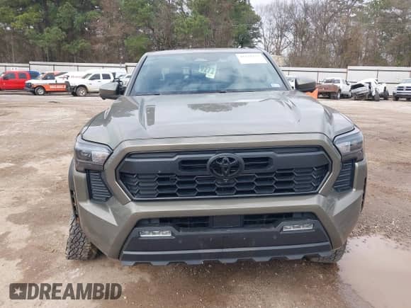2024 Toyota Tacoma SR5 with VIN 3TMLB5JN2RM044896, listed as a IAAI auction lot 41575173 with 4,293 mi miles and . Bid and sale history available at DreamBid. Image 12.