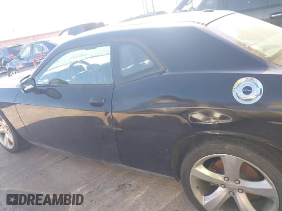 2014 Dodge Challenger SXT с VIN 2C3CDYAG3EH257611, выставлен на аукционе IAAI как лот 43549347 с пробегом 143 540 миль миль и . История ставок и продаж доступна на DreamBid. Изображение 14.