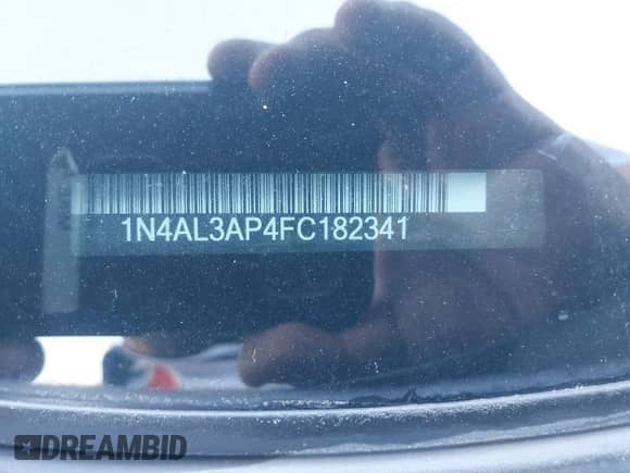 2015 Nissan Altima S z VIN 1N4AL3AP4FC182341, wystawiony jako IAAI lot #43305481 z przebiegiem 204 827 mil mil oraz . Historia ofert i sprzedaży dostępna na DreamBid. Obrazek 9.