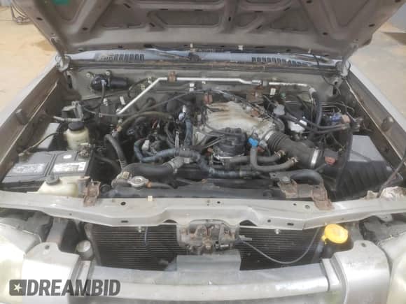 2004 Nissan Frontier XE with VIN 1N6ED29YX4C426939, listed as a Copart auction lot 69148455 with 241,492 mi miles and Clean title. Bid and sale history available at DreamBid. Image 11.