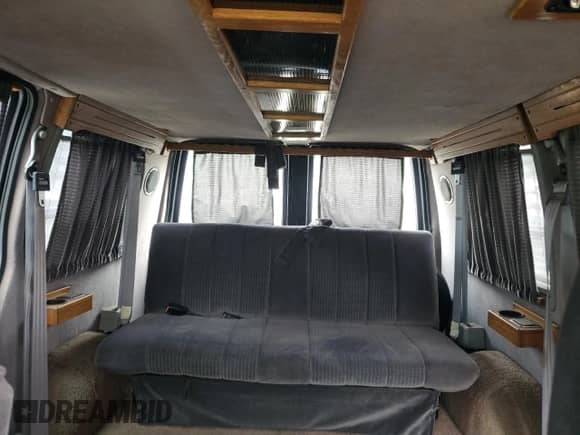 1992 Chevrolet Astro Cargo with VIN 1GBDM19Z3NB192740, listed as a Copart auction lot 69691115 with 185,801 mi miles and Salvage title. Bid and sale history available at DreamBid. Image 10.