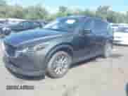 2022 Mazda CX-5 S Select z VIN JM3KFBBM1N0556352, wystawiony jako IAAI lot #43165375 z przebiegiem 20 649 mil mil oraz . Historia ofert i sprzedaży dostępna na DreamBid. Obrazek 17.