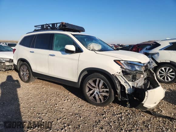 2017 Honda Pilot Touring с VIN 5FNYF6H94HB061937, выставлен на аукционе Copart как лот 85199525 с пробегом 74 908 миль миль и Списание • Salvage title. История ставок и продаж доступна на DreamBid. Изображение 4.