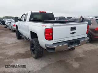 2016 Chevrolet Silverado 1500 LT z VIN 1GCVKREC7GZ240014, wystawiony jako IAAI lot #43115857 z przebiegiem 148 992 mil mil oraz . Historia ofert i sprzedaży dostępna na DreamBid. Obrazek 3.