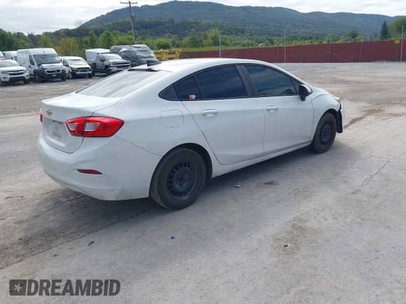 2018 Chevrolet Cruze LS with VIN 1G1BB5SM8J7129850, listed as a IAAI auction lot 43186067 with 145,615 mi miles and . Bid and sale history available at DreamBid. Image 4.