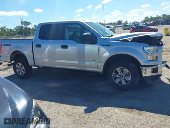 2017 Ford F-150 XLT z VIN 1FTEW1EG0HFB92156, wystawiony jako IAAI lot #43457491 z przebiegiem 156 076 mil mil oraz . Historia ofert i sprzedaży dostępna na DreamBid. Obrazek 13.